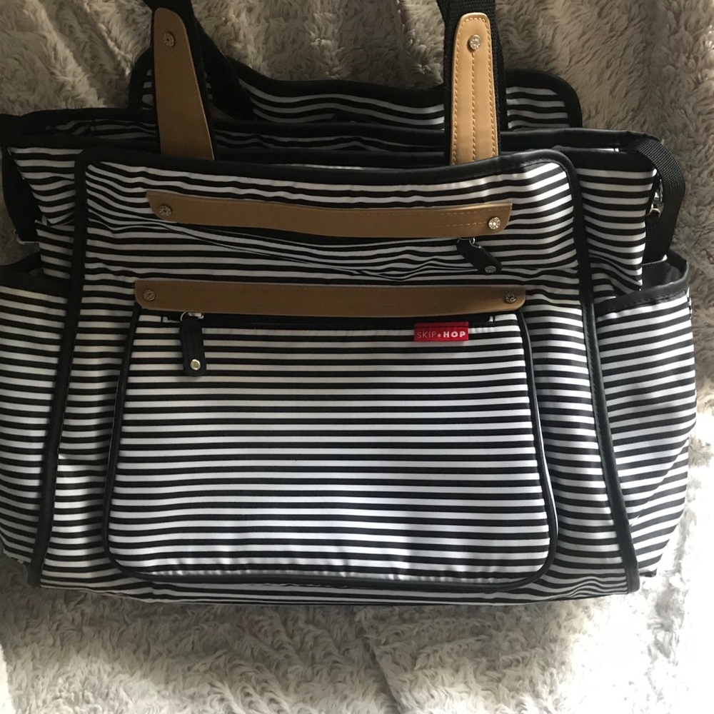 Skip Hop Unisex Baby Bag &changing pad. Used twice